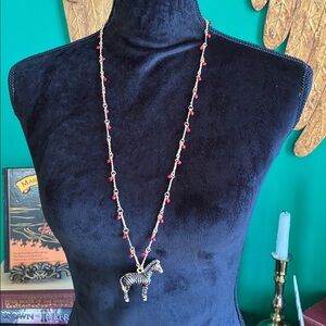 NWT Long goldtone zebra necklace with dark red dangling beads statement modern